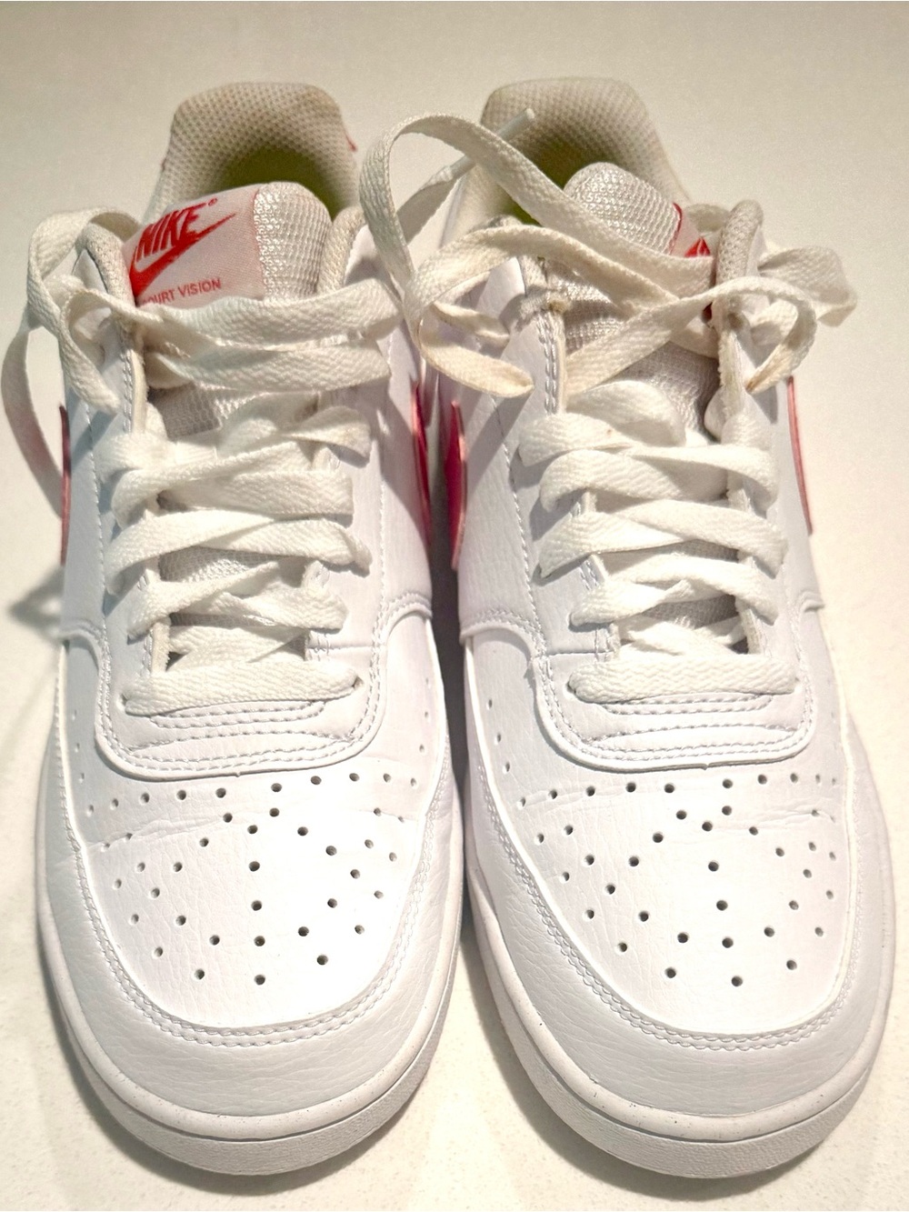 Nike Kids White Sneakers with Pink Swoosh
